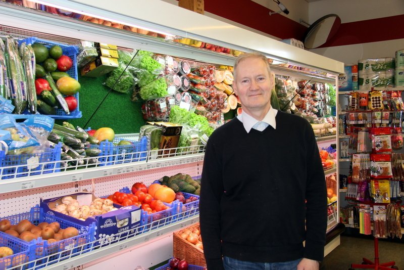 Ásgeir Einarsson, verslunarmaður í Hlíðarkaup. Mynd: PF.