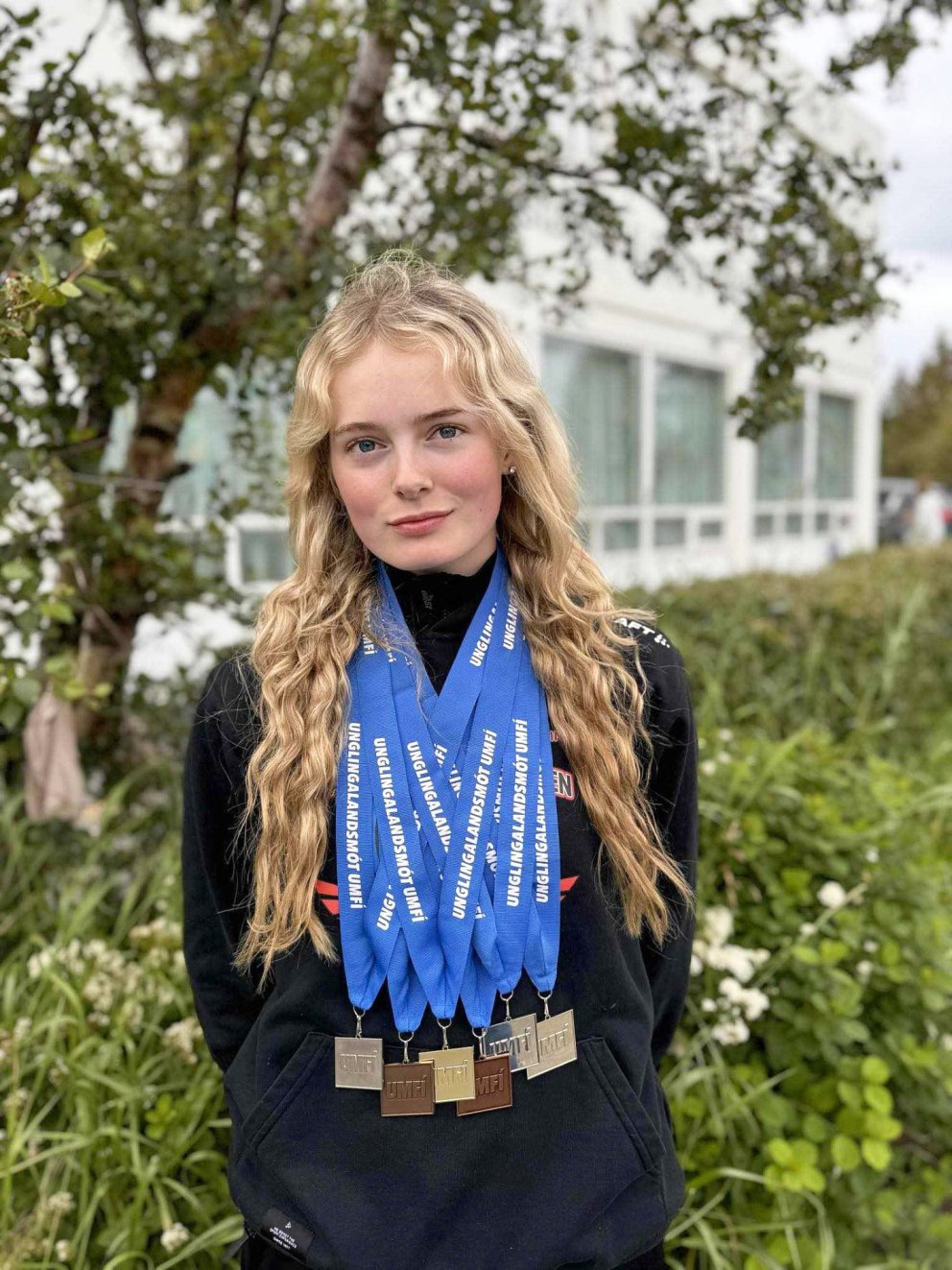 Súsanna Guðlaug með verðlaunapeningana að loknu Unglingalandsmóti UMFÍ í ágúst 2024. MYND AÐSEND.