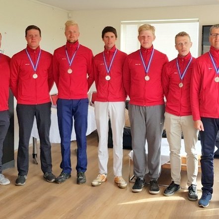 Karlasveit GSS með medalíu um hálsinn. Mynd af gss.is