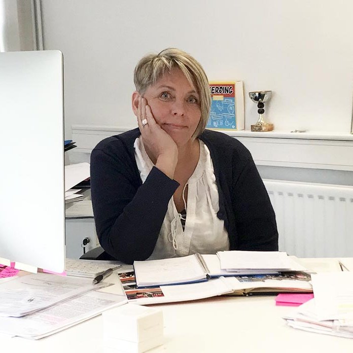 Þuríður Harpa á bak við skrifborðið. AÐSEND MYND