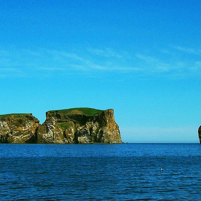 Drangey á Skagafirði. Á myndinni fyrir neðan má sjá Kristján Eiríksson frá Fagranes. MYNDIR AÐSENDAR