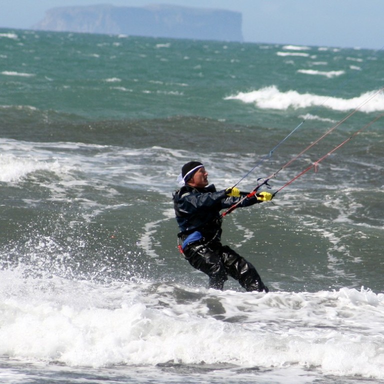 Á brimbretti við Garðssandinn