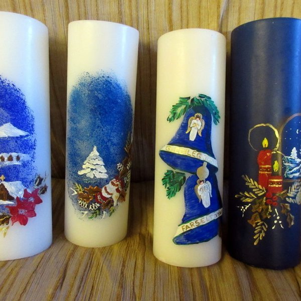 Meðal þess sem Dóra fæst við er að mála á kerti. Aðsend mynd